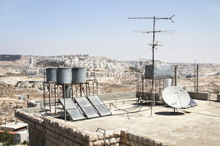 Water tank in Bethlehem in front of a settlement.